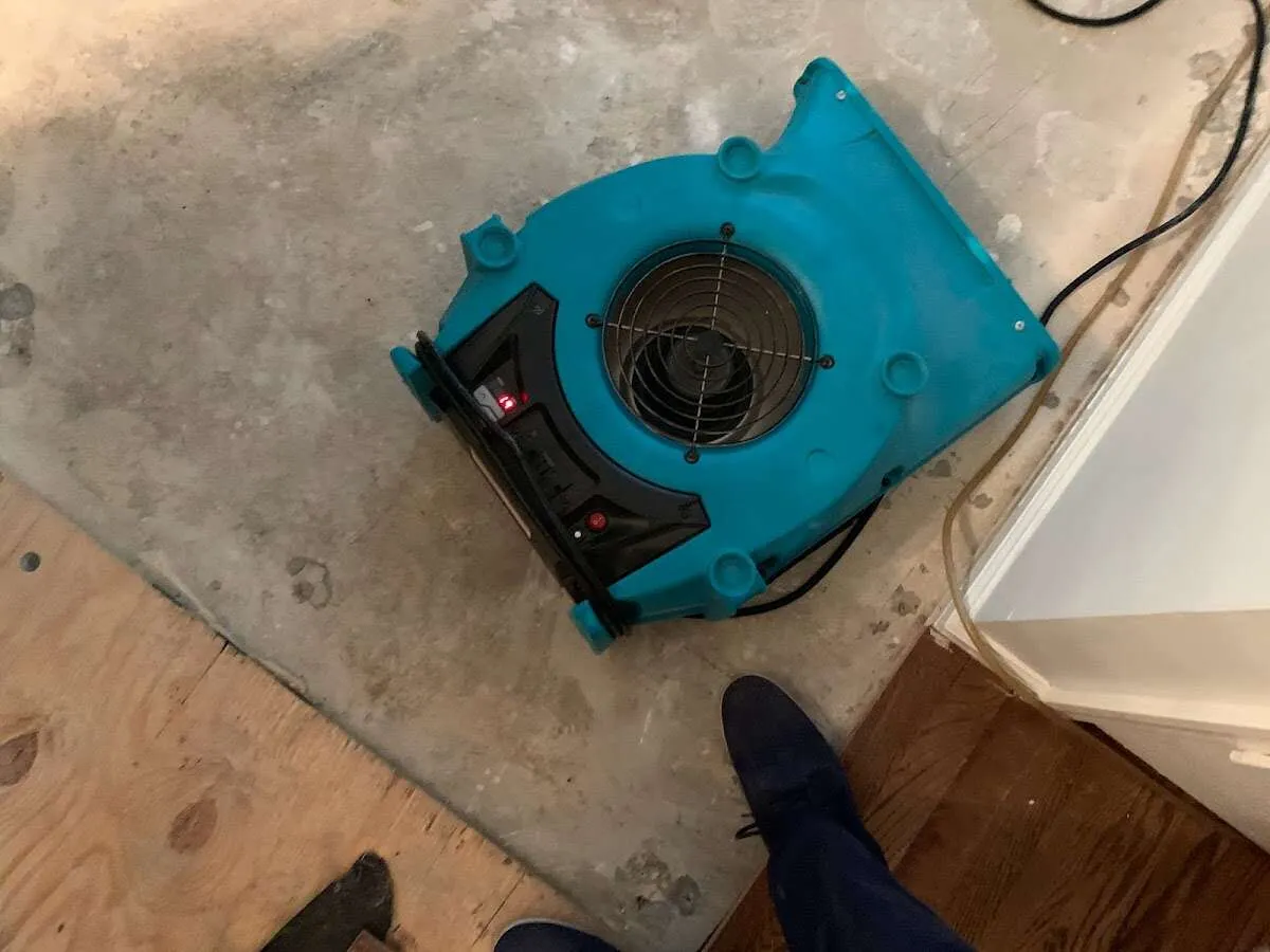 Air mover drying subfloor during Leak Detection & Repair in Hope Mills